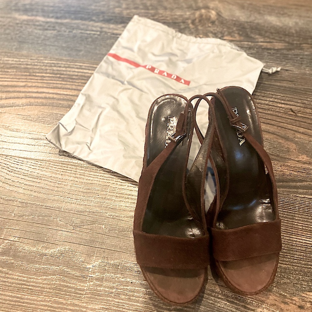 Prada wedge . Comfortable . Worn but it is in good shape
